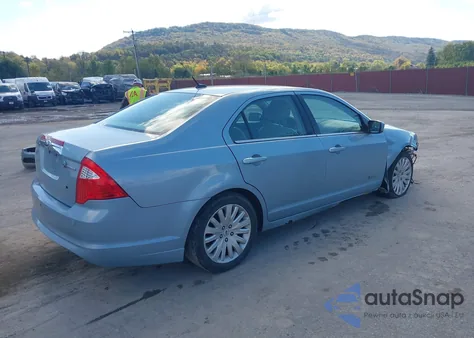 2010 Ford Fusion Hybrid z USA, uszkodzony, nr VIN 3FADP0L34AR392376
